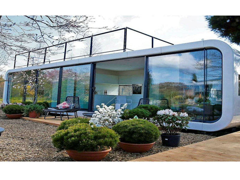 Economical capsule homes installations with panoramic glass walls